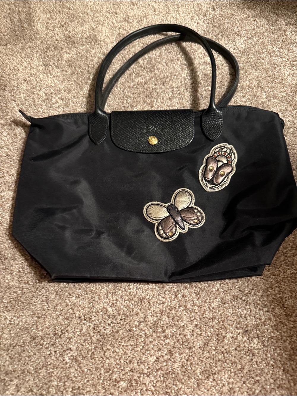 Longchamp Black Tote with Embroidered Butterfly and Patch Accents